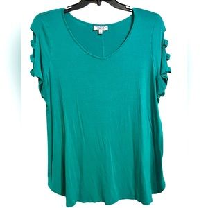 Teal Meera Lane shirt with cut outs on sleeve